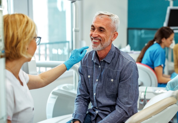 Dentist with patient